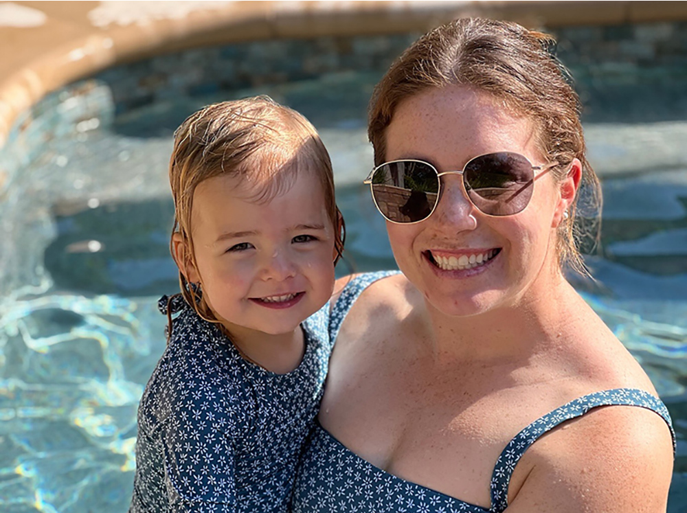 Wolf Ranch resident posing for a picture with her daughter in the resort-style pool Wolf Ranch resident posing for a picture with her daughter in the resort-style pool