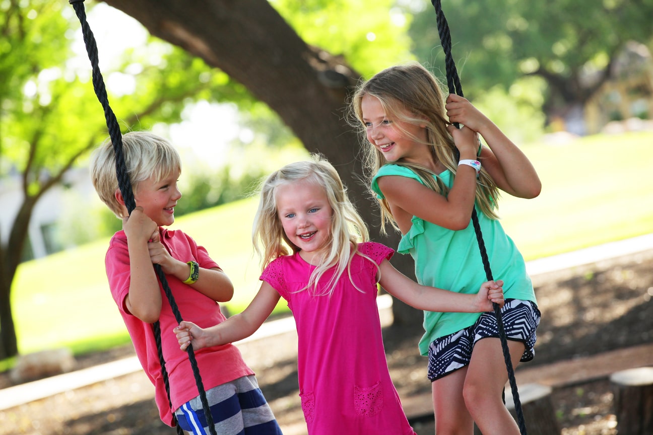 kids on a swing