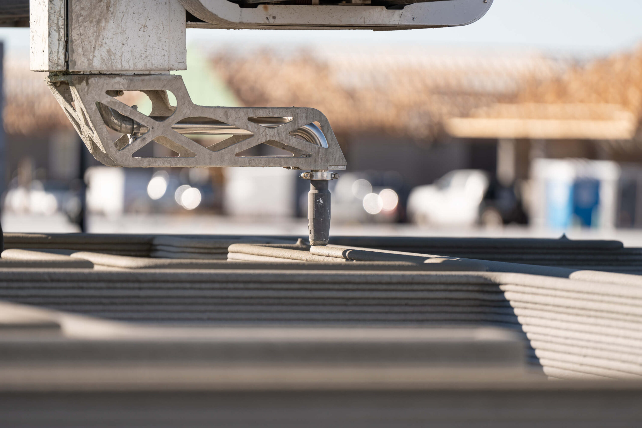 Vulkan printer printing lavacrete walls for 3-d printed home